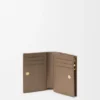 Anagram Compact Wallet in Pebble Grained Calfskin Anagram Compact Wallet in Pebble Grained Calfskin