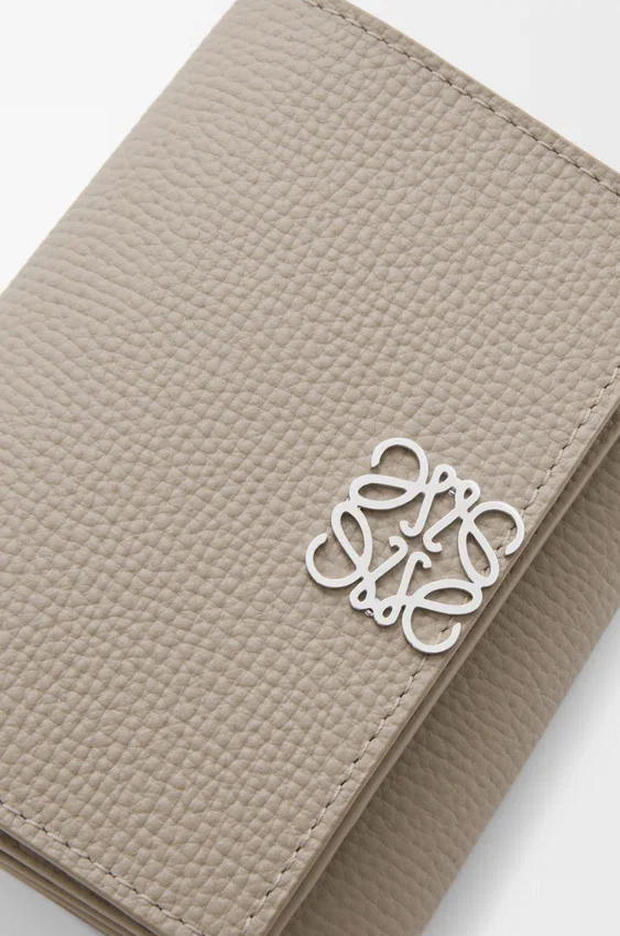 Anagram Trifold Wallet in Pebble Grained Calfskin Anagram Trifold Wallet in Pebble Grained Calfskin