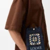 Drawstring Pocket in Classic Calfskin and Raffia Drawstring Pocket in Classic Calfskin and Raffia