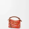 Mini Puzzle Edge Bag in Raffia and Calfskin Mini Puzzle Edge Bag in Raffia and Calfskin