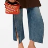 Mini Puzzle Edge Bag in Raffia and Calfskin Mini Puzzle Edge Bag in Raffia and Calfskin