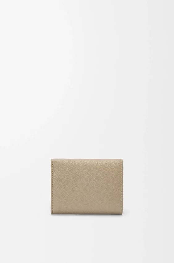 Pebble Trifold Wallet in Pebble Grained Calfskin Pebble Trifold Wallet in Pebble Grained Calfskin