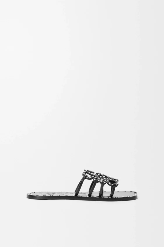Petal Anagram Slide in Vegetable-Tanned Calfskin and Metallic Studs Petal Anagram Slide in Vegetable-Tanned Calfskin and Metallic Studs