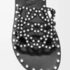 Petal Anagram Slide in Vegetable-Tanned Calfskin and Metallic Studs Petal Anagram Slide in Vegetable-Tanned Calfskin and Metallic Studs