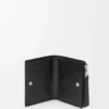 Puzzle Slim Compact Wallet in Supple Grained Calfskin Puzzle Slim Compact Wallet in Supple Grained Calfskin
