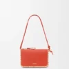 Rio Pouch in Classic Calfskin and Raffia Rio Pouch in Classic Calfskin and Raffia