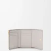 Small Vertical Wallet in Smooth and Grained Calfskin Small Vertical Wallet in Smooth and Grained Calfskin